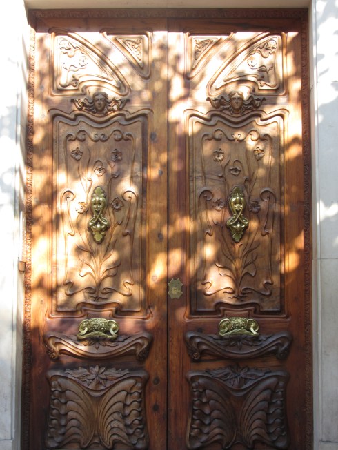 Ornate door with plays of shadow and light